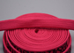 La corde tressée de 11mm de polyester fait sur commande de vêtements a imprimé le logo brillant circulaire de silicone