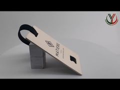 Les étiquettes volantes de marque de logo de relief faites sur commande de vue ont réutilisé le papier pour la démonstration d'habillement