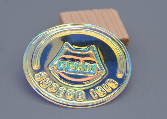 La coutume transparente de correction d'habillement d'arc-en-ciel a gravé le matériel en refief de film de PVC du logo 3D