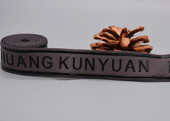 Les vêtements emploient non la bande élastique de glissement avec le logo brillant de silicone imprimé par coutume